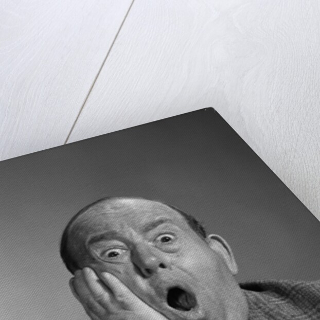 1960s balding man with a shocked expression by Anonymous