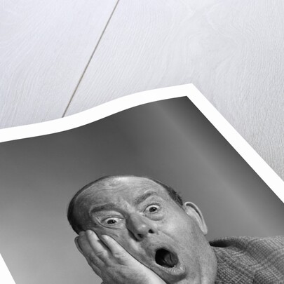 1960s balding man with a shocked expression by Anonymous