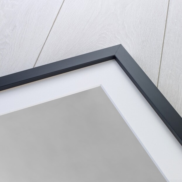 1970s smiling young man working on a budget by Anonymous