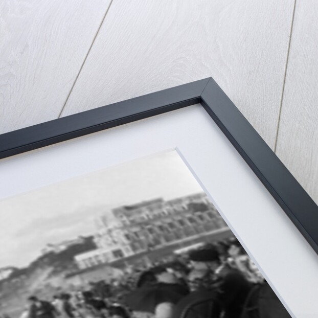 1920s two women sitting on the beach in bathing suits by Anonymous