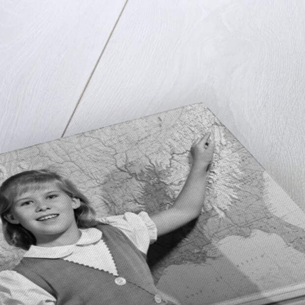 1960s school girl pointing to map of the USA by Anonymous