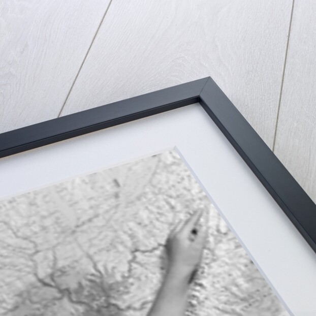 1960s school girl pointing to map of the USA by Anonymous