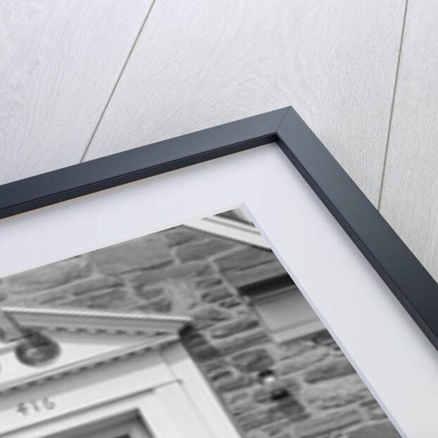 1950s smiling businessman walking out the front door of his house by Anonymous