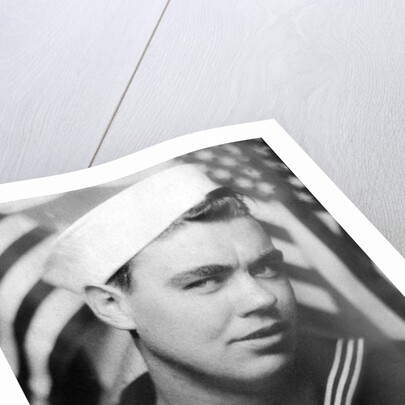 Photo booth portrait of WWII sailor, ca. 1943. by Anonymous