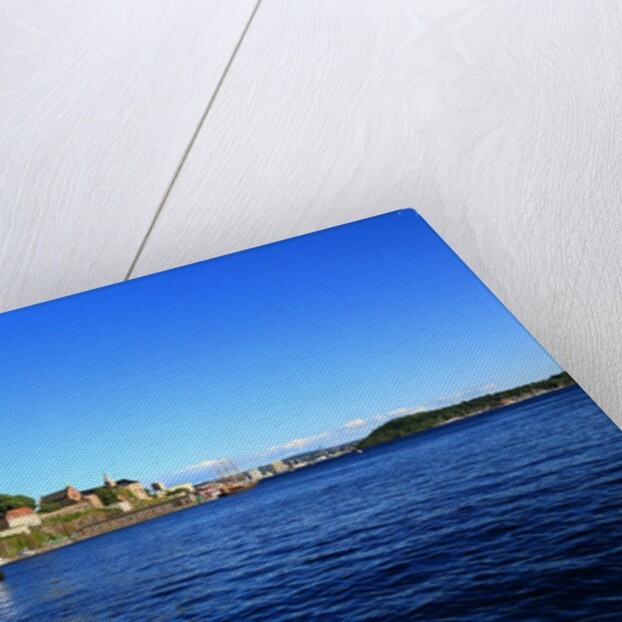 Aker Brygge district near the seaport. by Anonymous