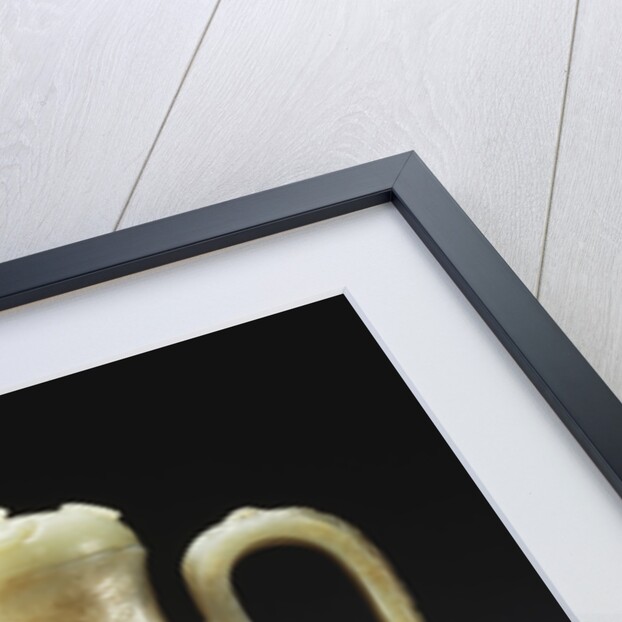 A late Ming celadon jade ewer and cover by Anonymous