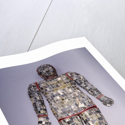 An important archaic spinach green and yellow nephrite jade burial suit assembled in ten sections by Anonymous