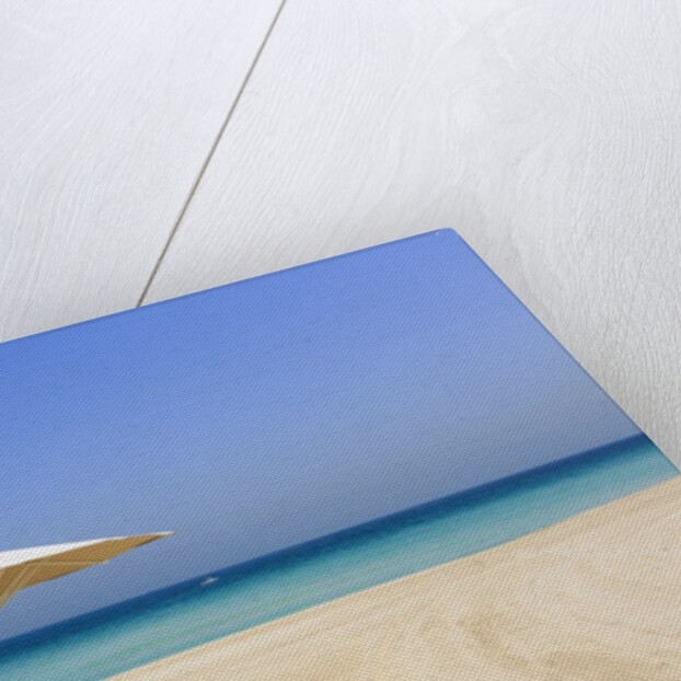 Parasol and recliner on the beach, Dubai by Anonymous