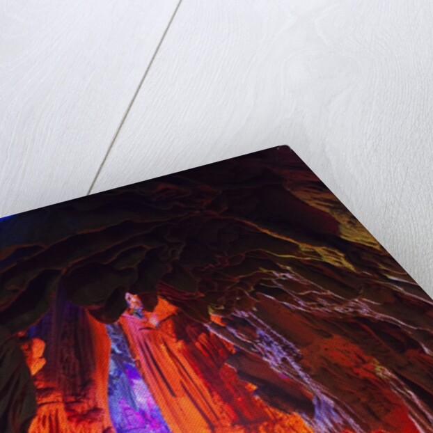 Multi Colored Lights in the Reed Flute Cave by Anonymous