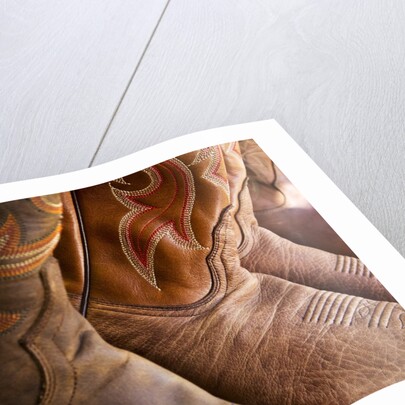 Line up of new cowboy boots in Old Scottsdale by Anonymous