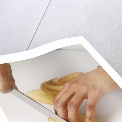 Sliced potato by Anonymous