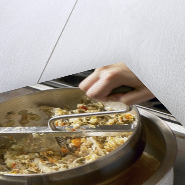 Ingredients in a food mill by Anonymous