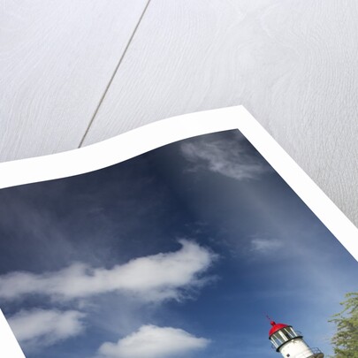Morning light on Diamond Head Lighthouse with Puffy Clouds by Anonymous