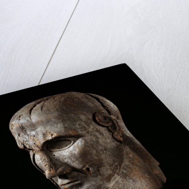 Etruscan sculpture of virile head by Anonymous