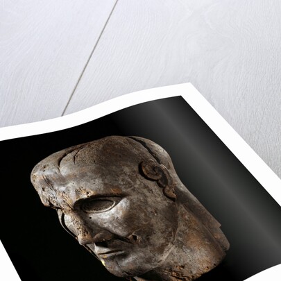 Etruscan sculpture of virile head by Anonymous