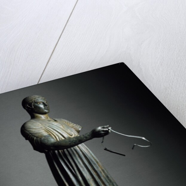 The Charioteer of Delphi, also known as Heniokhos by Anonymous