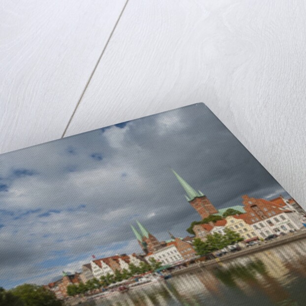 View of Petrikirche from Fussgangerbrucke on Trave canal by Anonymous