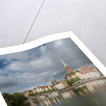 View of Petrikirche from Fussgangerbrucke on Trave canal by Anonymous