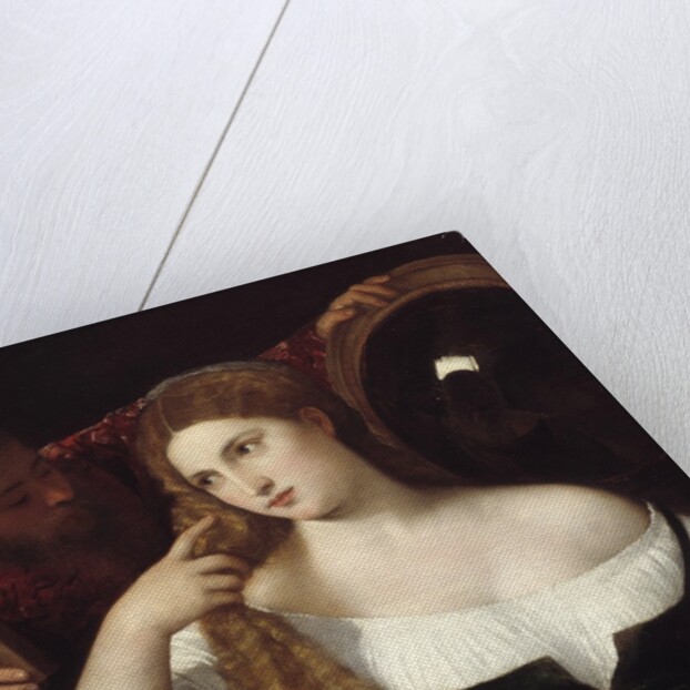Portrait of a woman at a her toilet by Tiziano Vecellio