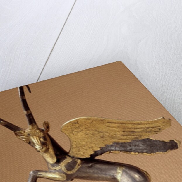 Achaemenid ceremonial handle with winged silver and gold ibex by Anonymous