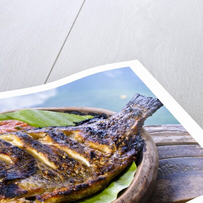 Grilled nila fish, served with banana leave by Anonymous