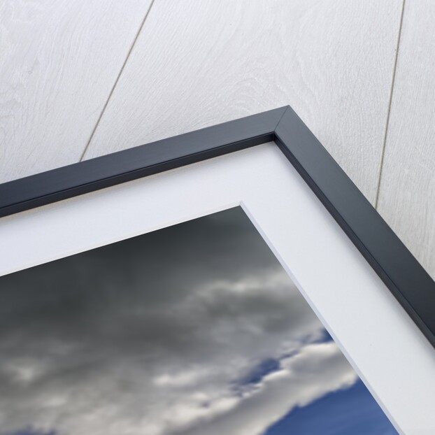 Clouds over fjord in the winter. by Anonymous