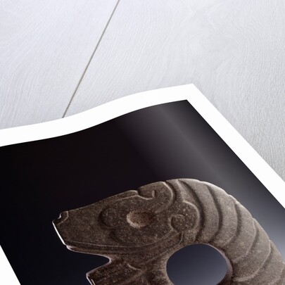 Stone ax representing a stylized snake by Anonymous