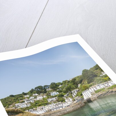 Polperro is a village with beautiful ancient houses along a canal by Anonymous