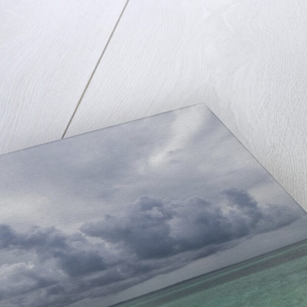 Rain clouds and thunderstorm at sea. by Anonymous