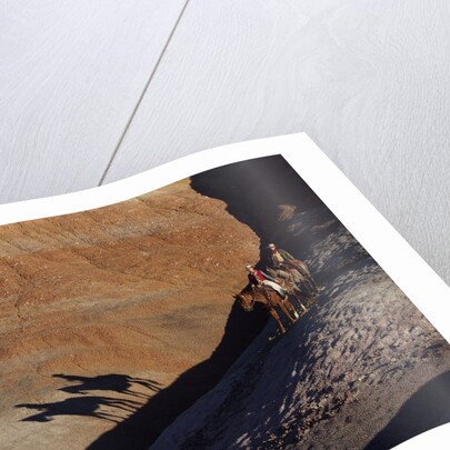Riders with Shadow coming down Hill in Painted Desert by Anonymous