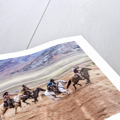 Cowboy's in motion across the field by Anonymous