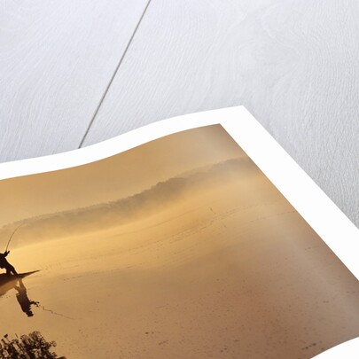 Man Fishing at Lake by Anonymous