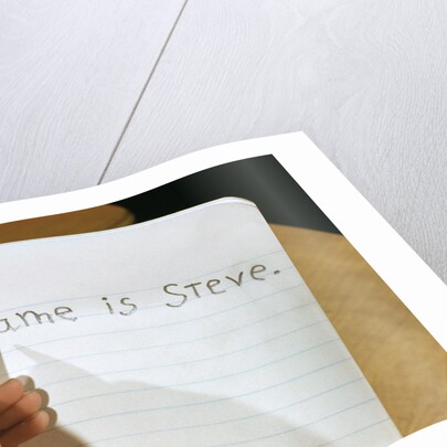 Schoolboy Writing Name in Notebook by Anonymous