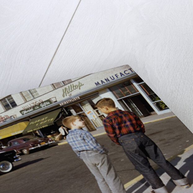 Boys Standing Alongside Strip Mall Parking Lot by Anonymous