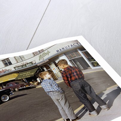 Boys Standing Alongside Strip Mall Parking Lot by Anonymous