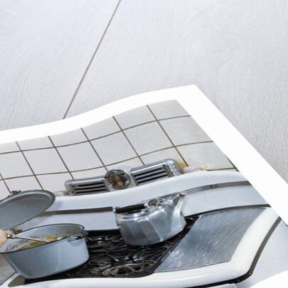 Girl Stirring Soup in Kitchen by Anonymous