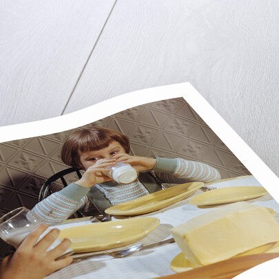 Children Drinking Milk at Dinner Table by Anonymous
