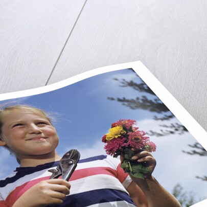 Girl Holding Cut Flowers by Anonymous