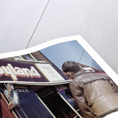 Boy Windowshopping at Toyland by Anonymous