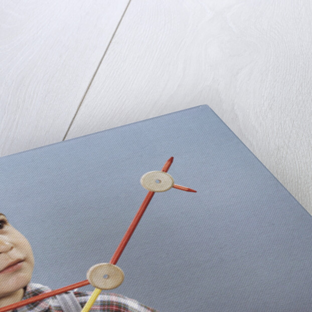 Boy Playing with Tinkertoys (TM) by Anonymous