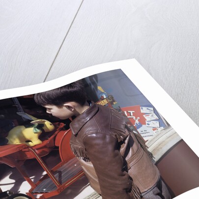Boy Window Shopping at a Toystore by Anonymous