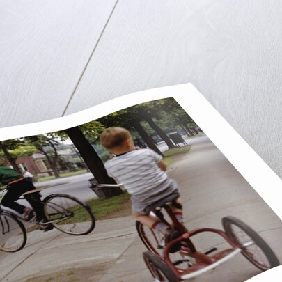 Boys Riding Their Bike and Tricycle by Anonymous