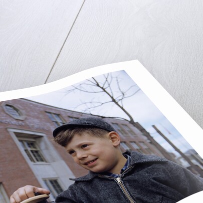 Boy Standing in Schoolyard by Anonymous