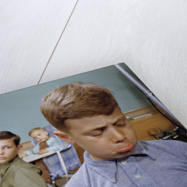 Boy Pouting near the Dinner Table by Anonymous