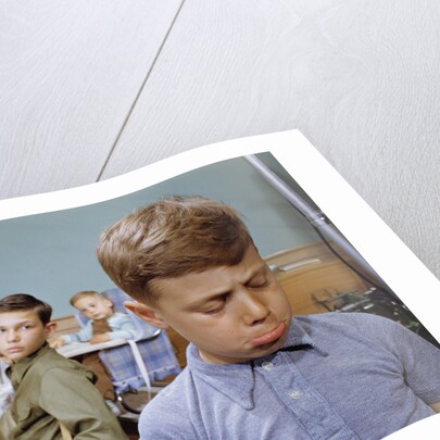 Boy Pouting near the Dinner Table by Anonymous