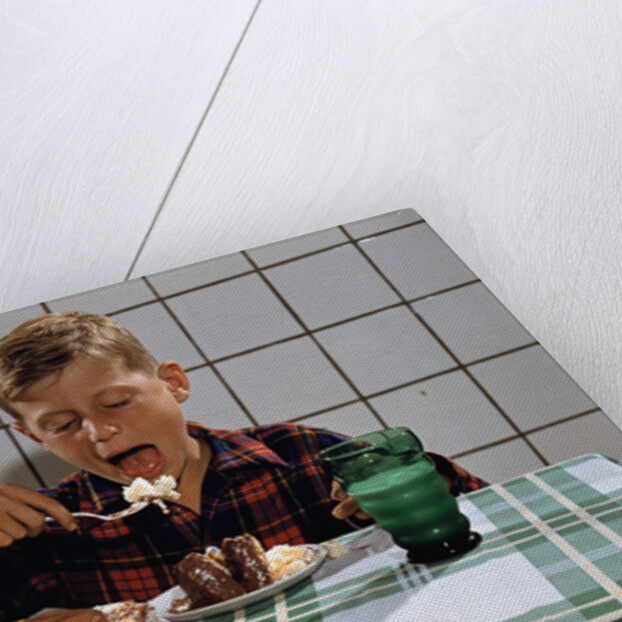 Boy Eating a Slice of Cake by Anonymous