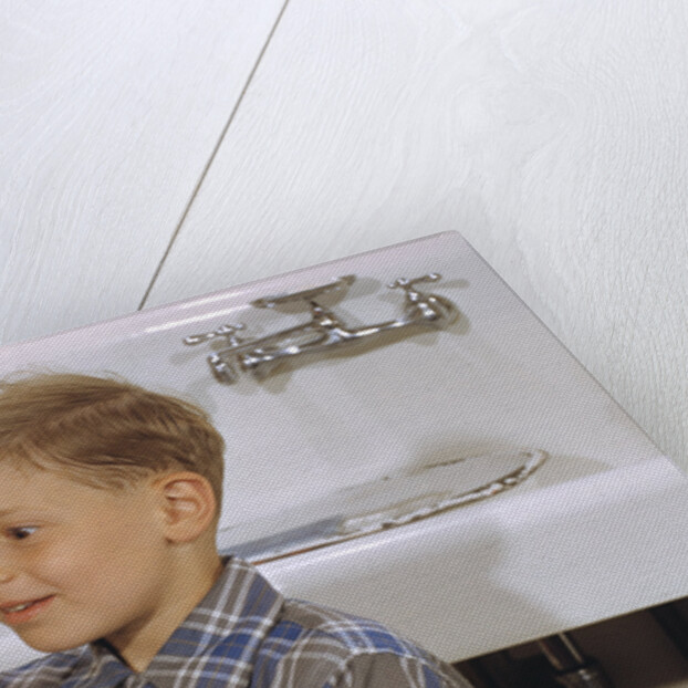 Boy Drying Serving Spoon by Anonymous