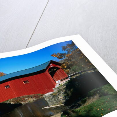 Red Covered Bridge on Rural Road by Anonymous