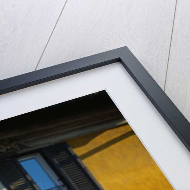 Shuttered Windows on Yellow Building by Anonymous