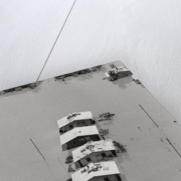 Row Of Houses Sits Flooded By Hurricane by Anonymous